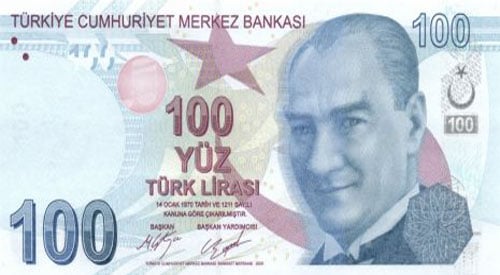 ムスタファ・ケマル・アタテュルクの肖像とTÜRKİYE CUMHURİYET MERKEZ BANKASIという文字が印刷された100トルコリラ紙幣。.